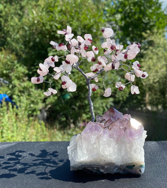 Rose quartz and garnet tree sculpture