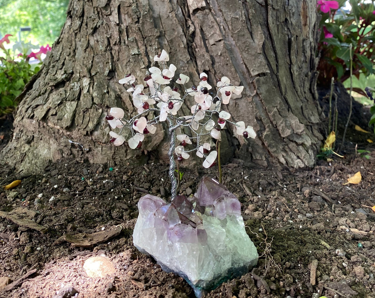 Rose quartz and garnet tree sculpture
